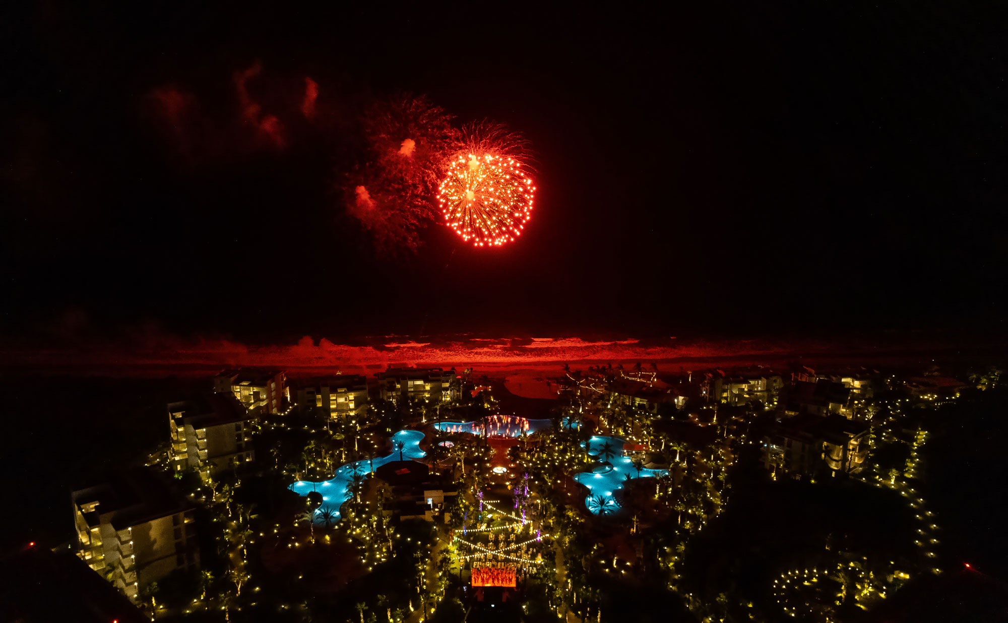 Fireworks sparkle in the sky above the Conrad Punta de Mita resort.