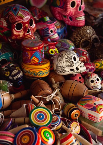 Exquisite handmade skull art accompanied by various playful gadgets and trinkets.