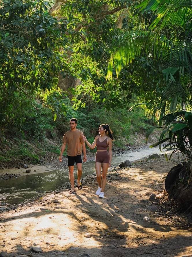 Couple enjoying a walk in the mexican jungle