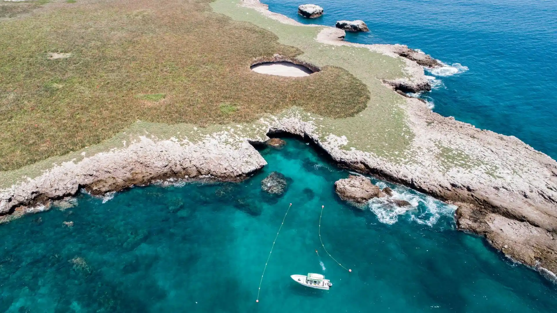 An aerial photograph captures the stunning beauty of the Marieta Islands.